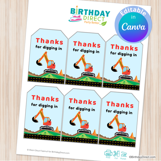 Sheet of construction-themed thank you tags with excavator graphics on a light wooden surface.