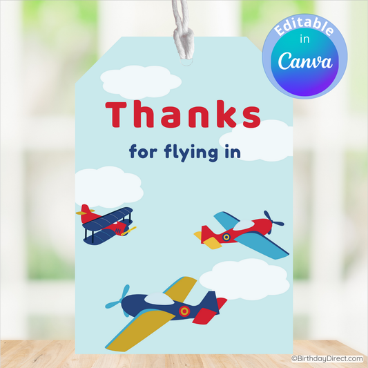 Gift tag with airplanes and 'Thanks for flying in' text on a light blue background