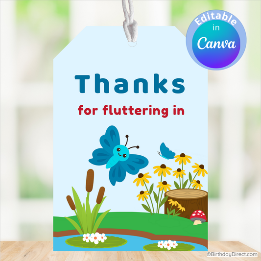 Gift tag with a blue butterfly, flowers, and text 'Thanks for fluttering in' on a blurred nature background.