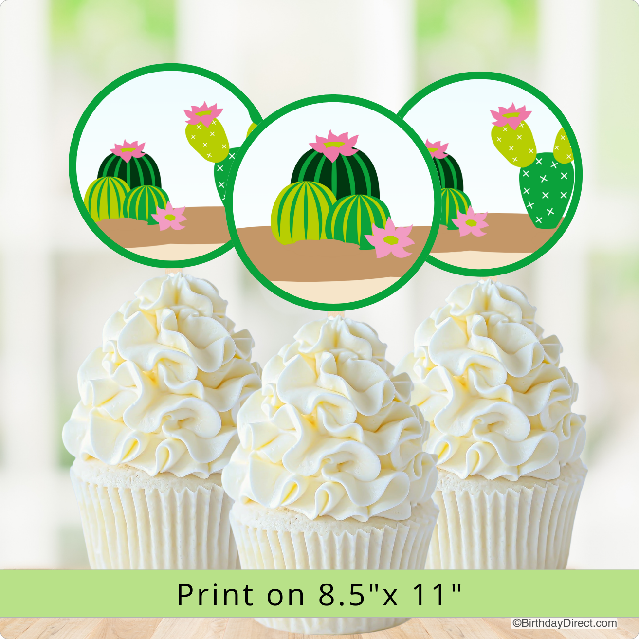 Cupcakes with white frosting and cactus design on top, with a green border and text indicating print size.