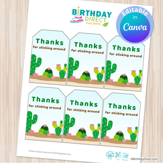 Sheet of 'Thanks for sticking around' cards with cactus illustrations on a wooden surface.