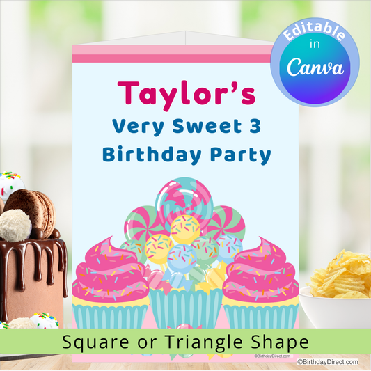 Birthday centerpiece decoration with colorful cupcakes and text 'Taylor's Very Sweet 3 Birthday Party' on a blurred background.