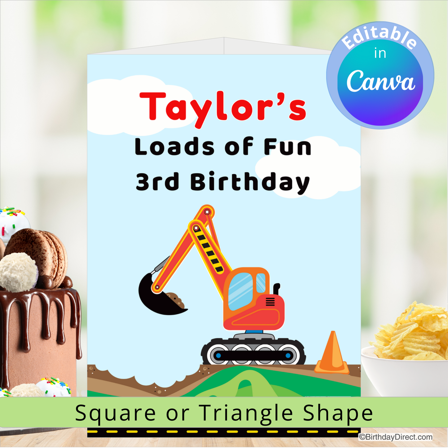 Birthday centerpiece decoration with an excavator, cake, and chips on a blurred background