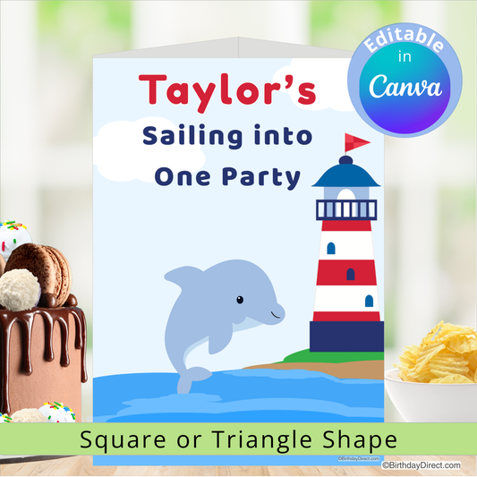 Birthday centerpiece decoration with a dolphin and lighthouse design, featuring the text 'Taylor's Sailing into One Party'.