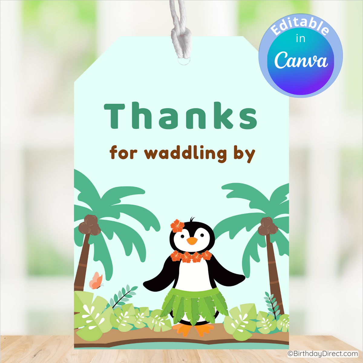 Card with a penguin character and palm trees, featuring the text 'Thanks for waddling by'.