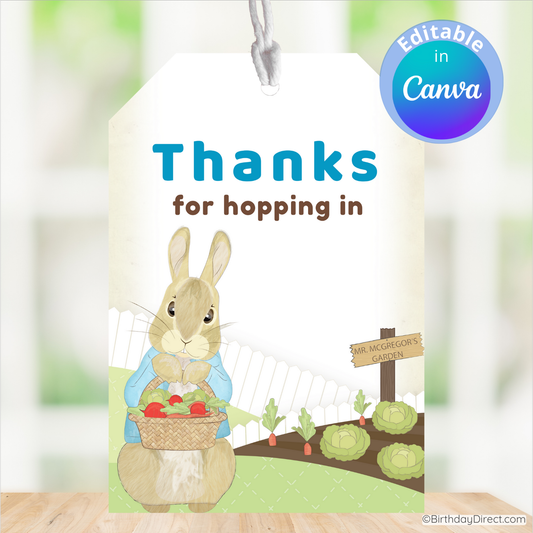 Card with a rabbit holding a basket of vegetables and text 'Thanks for hopping in' on a blurred garden background.