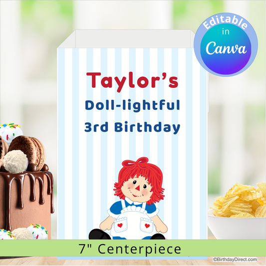 Birthday centerpiece with a doll illustration and text 'Taylor's Doll-lightful 3rd Birthday' on a striped background.