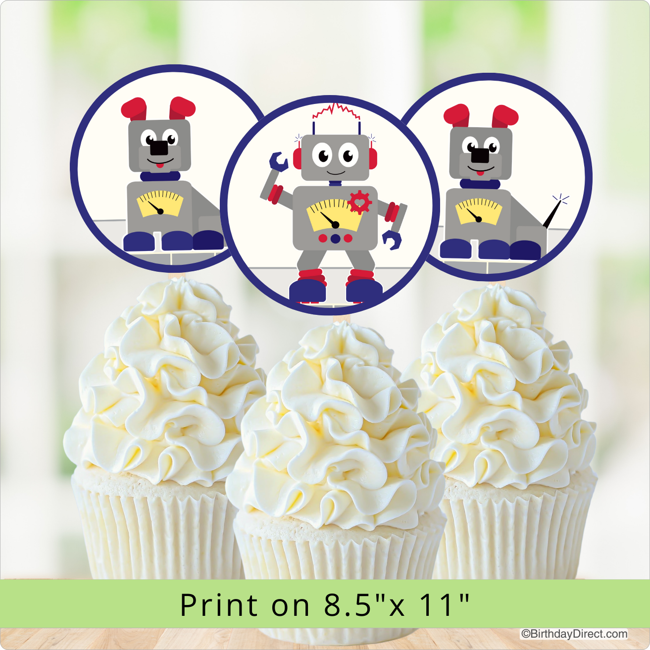 Cupcakes with robot-themed toppers on a light green background