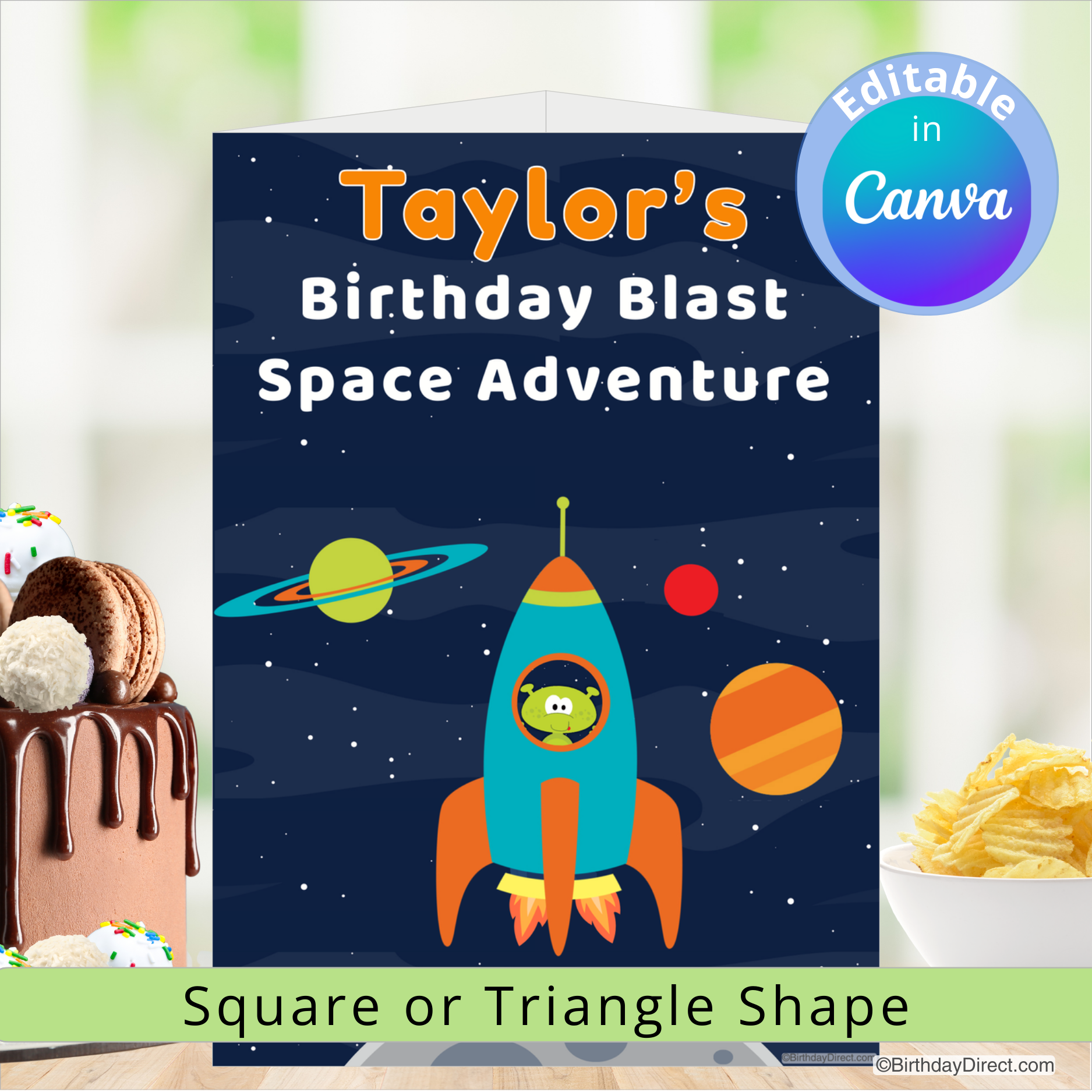 Birthday centerpiece decoration with a rocket and planets, surrounded by party food.